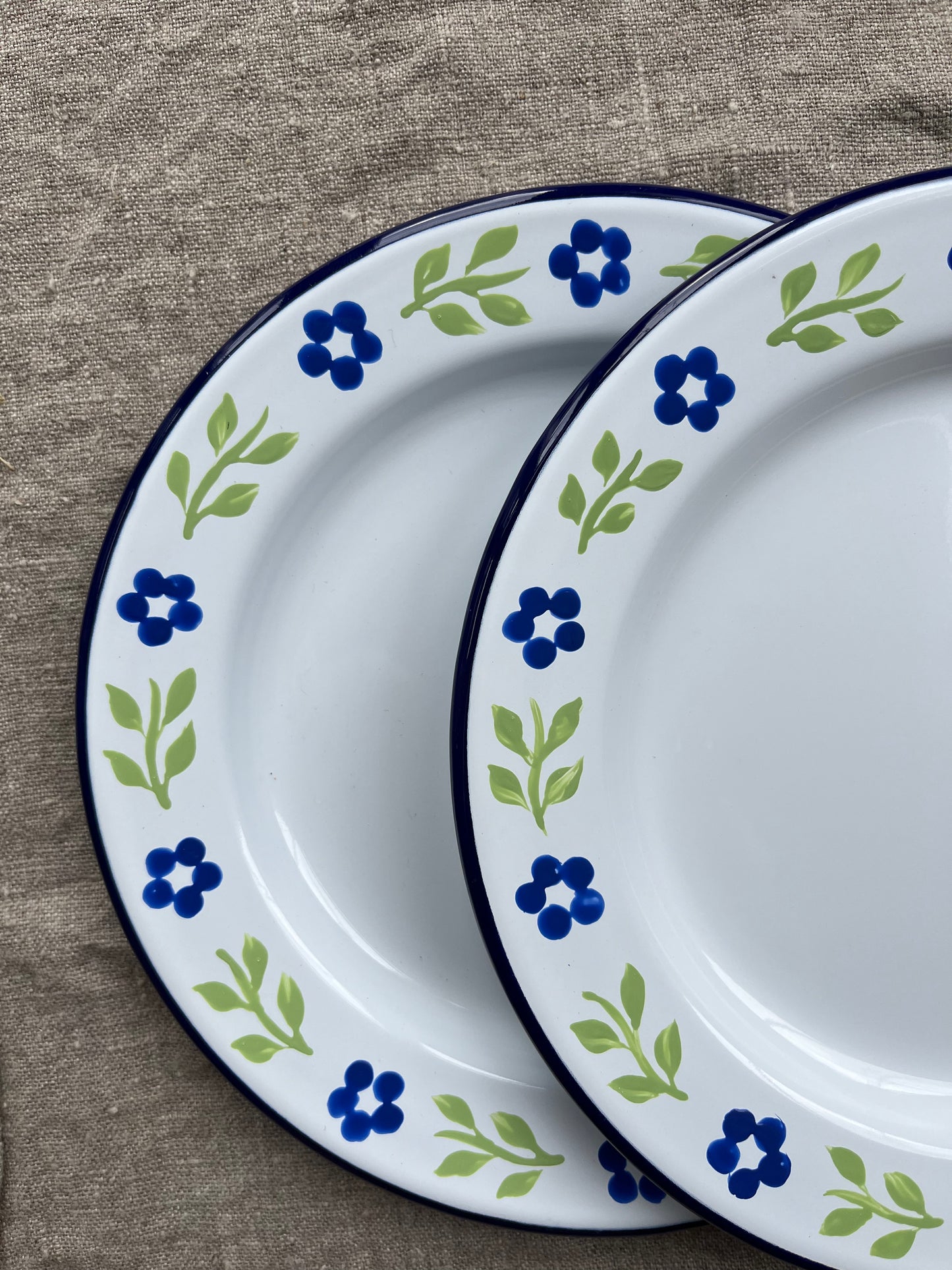 Pair of Enamel Side Plates, Blue and White Base, Folk Ribbons